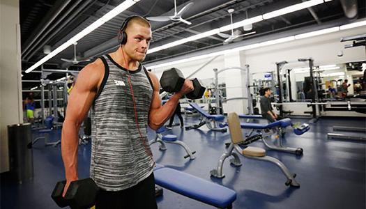 Guy lifting weights